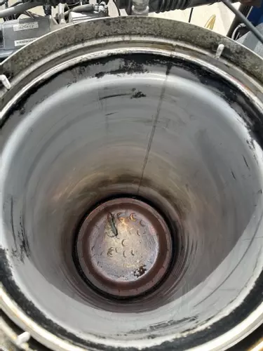 Cleaned boiler jacket on Nilfisk Contractor hot pressure washer after removing burst heating coil and soot buildup.